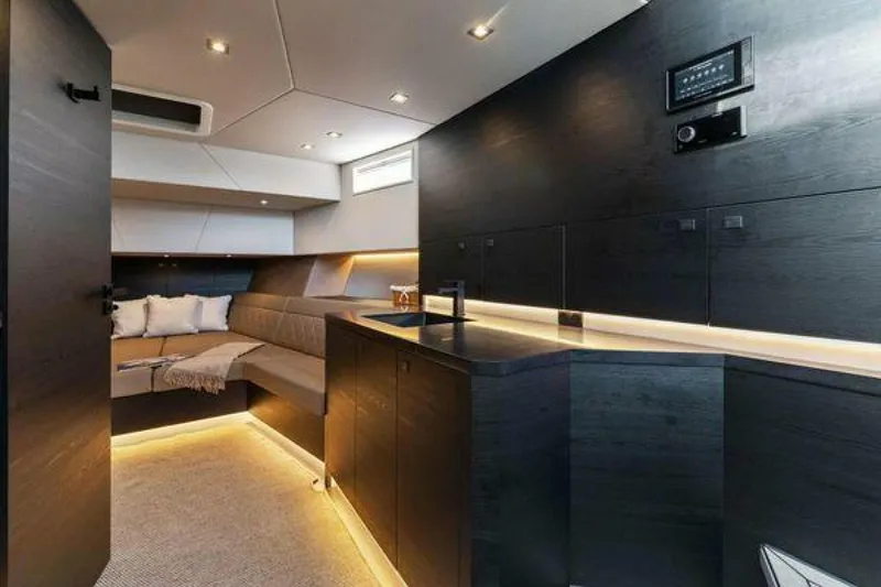 Slide: The Image of Luxurious interior of 2021 Vanquish VQ58 yacht with modern design and ambient lighting. - 26