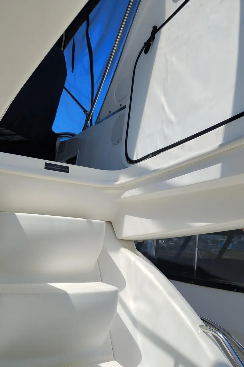 Slide: The Image of Staircase on 2001 Bayliner 3488 Command Bridge Motoryacht, leading to upper deck. - 12