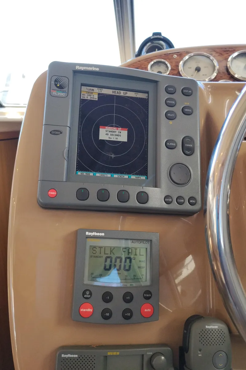 Slide: The Image of Control panel of a 2001 Bayliner 3488 Command Bridge Motoryacht with navigation equipment. - 37