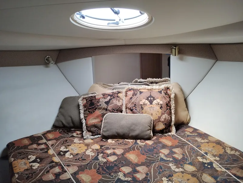 Slide: The Image of Interior cabin of 2001 Bayliner 3488 Command Bridge Motoryacht with floral bedding. - 43