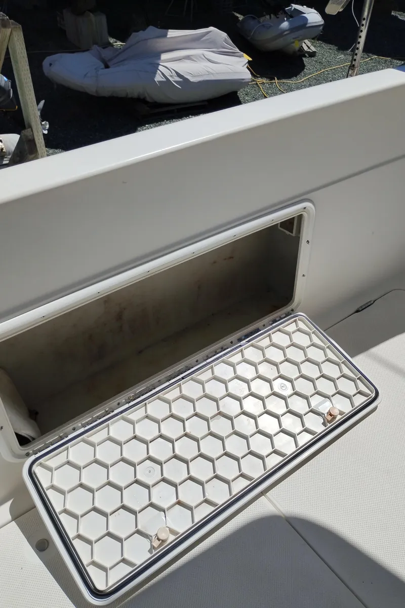 Slide: The Image of Open storage compartment on 2001 Bayliner 3488 Command Bridge Motoryacht deck. - 6