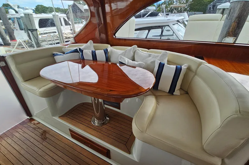 Slide: The Image of Luxurious 2005 San Juan 48 yacht interior with elegant seating and polished wood table. - 57