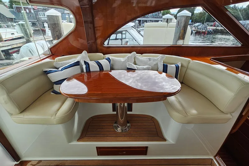 Slide: The Image of Luxurious 2005 San Juan 48 yacht interior with elegant seating and polished wood table. - 58