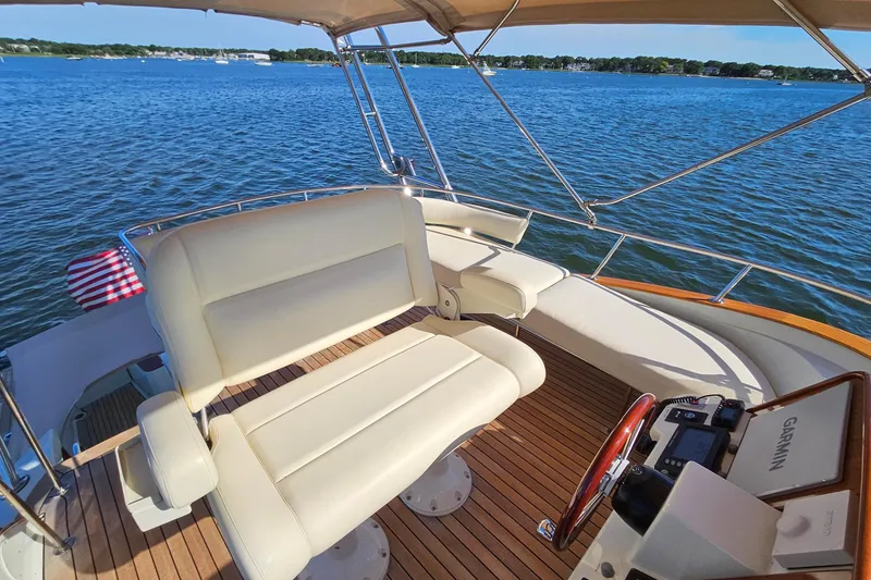 Slide: The Image of Flybridge of 2005 San Juan SJ 48 yacht with seating and navigation equipment. - 40