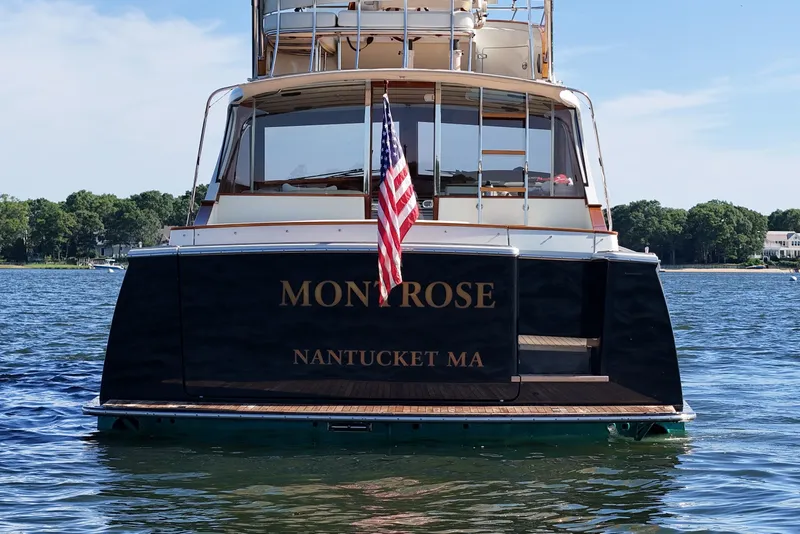 Slide: The Image of San Juan SJ 48 Flybridge yacht, 2005 model, named Montrose, docked in Nantucket, MA. - 17