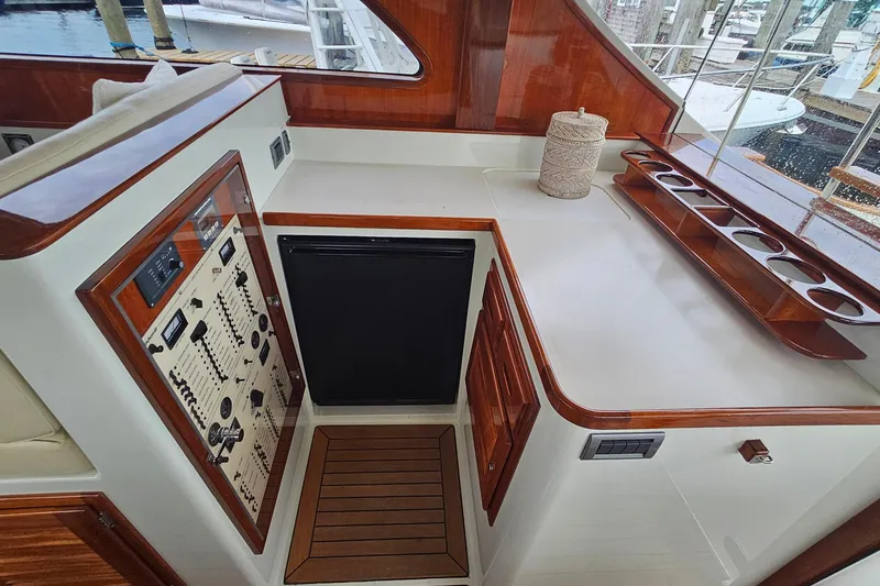 Slide: The Image of Luxurious 2005 San Juan 48 yacht interior with control panel and wooden accents. - 45