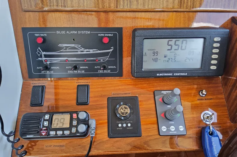 Slide: The Image of Control panel of a 2005 San Juan 48 yacht with electronic and bilge systems. - 55