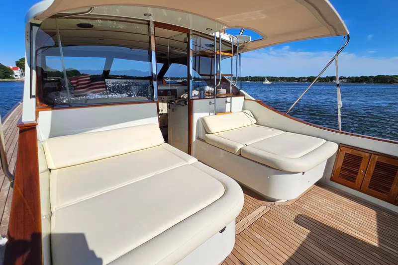 Slide: The Image of Luxurious 2005 San Juan SJ 48 Flybridge yacht interior with comfortable seating and scenic water view. - 35