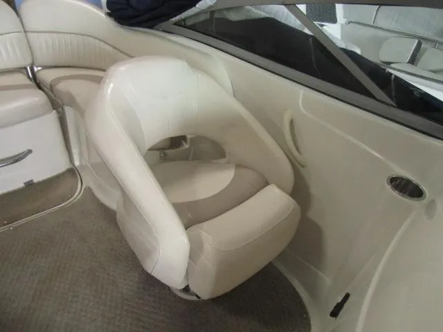 Slide: The Image of 2007 Azure AZ220 deckboat interior with white leather seating and carpeted flooring. - 15