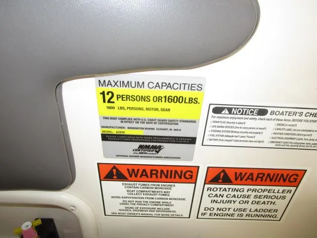Slide: The Image of 2007 Azure AZ220 deckboat capacity and safety warning labels, maximum 12 persons or 1600 lbs. - 9