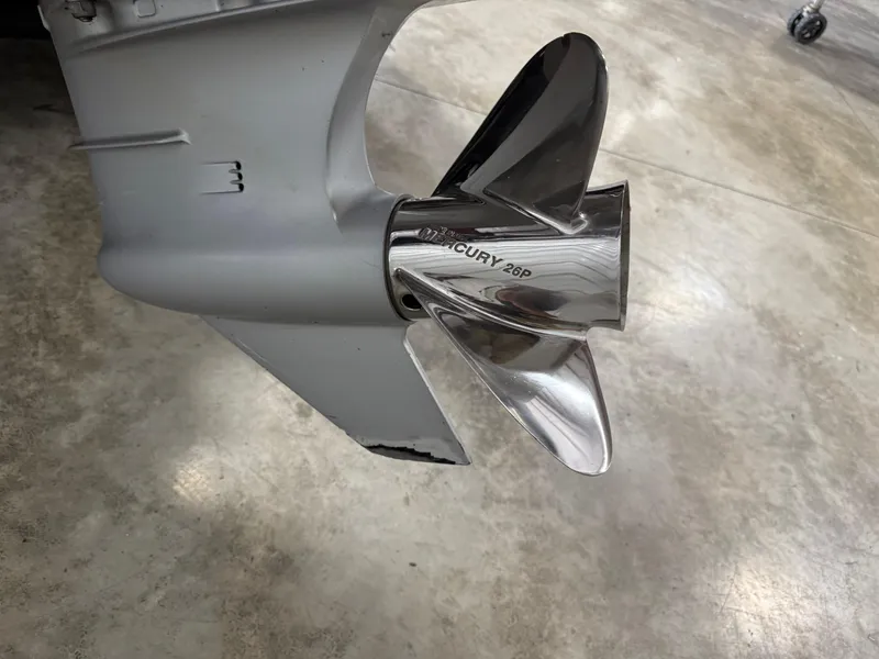 Slide: The Image of 2018 Bass Cat Eyra boat with Mercury 26P propeller on concrete floor. - 6