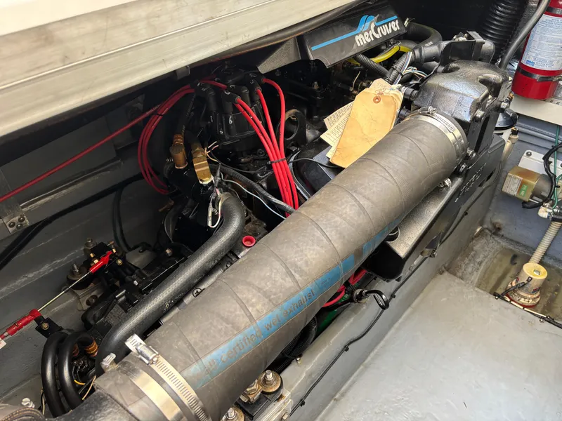 Slide: The Image of Engine compartment of a 1992 Sea Ray 400 EXPRESS with MerCruiser components. - 23