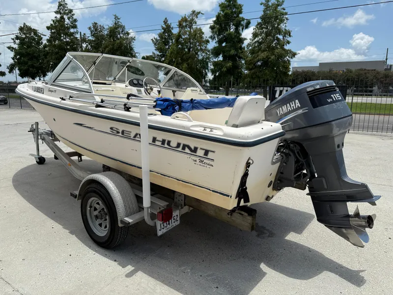 Slide: The Image of 2004 Sea Hunt Escape 175 boat with Yamaha V4 115 engine on trailer. - 5