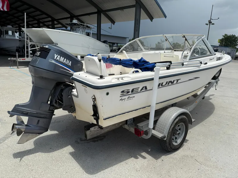 Slide: The Image of 2004 Sea Hunt Escape 175 boat with Yamaha outboard motor on trailer. - 7