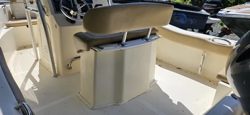 Slide: The Image of 2016 Scout 195 Sportfish boat interior with steering wheel and seating. - 4