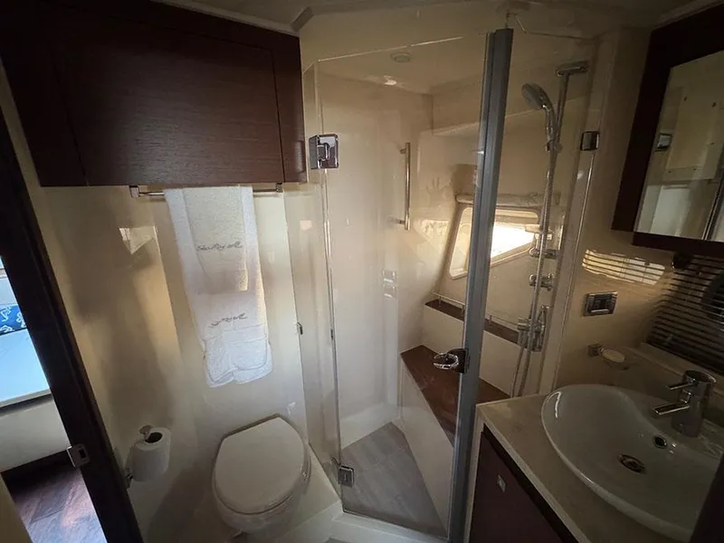 Slide: The Image of Luxurious bathroom in 2015 Sea Ray 510 Sundancer yacht with modern fixtures and shower. - 24