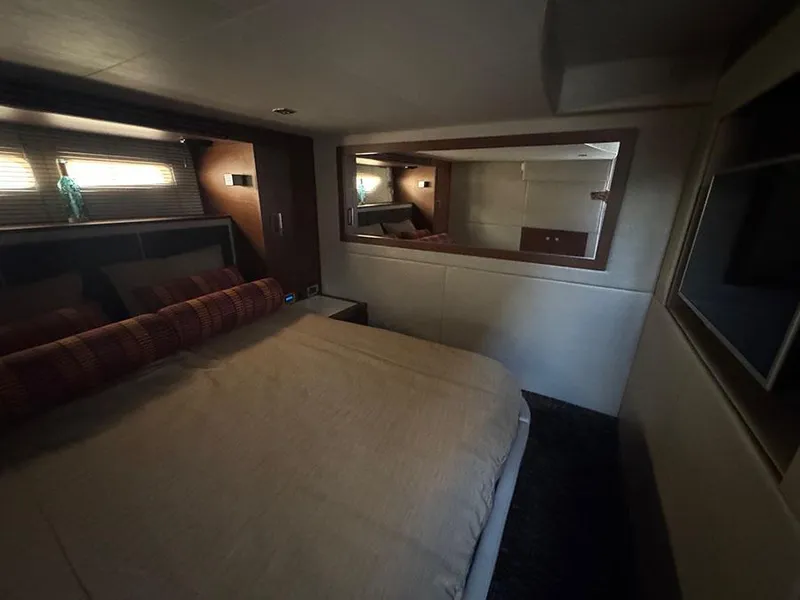 Slide: The Image of Luxurious bedroom interior of 2015 Sea Ray 510 Sundancer yacht with modern design elements. - 36