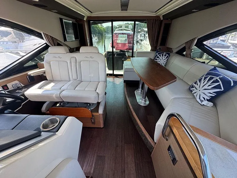 Slide: The Image of Luxurious interior of 2015 Sea Ray 510 Sundancer yacht with plush seating and elegant decor. - 40
