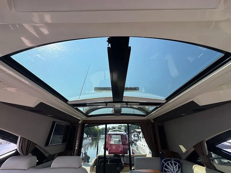 Slide: The Image of Interior view of 2015 Sea Ray 510 Sundancer yacht with panoramic sunroof. - 41