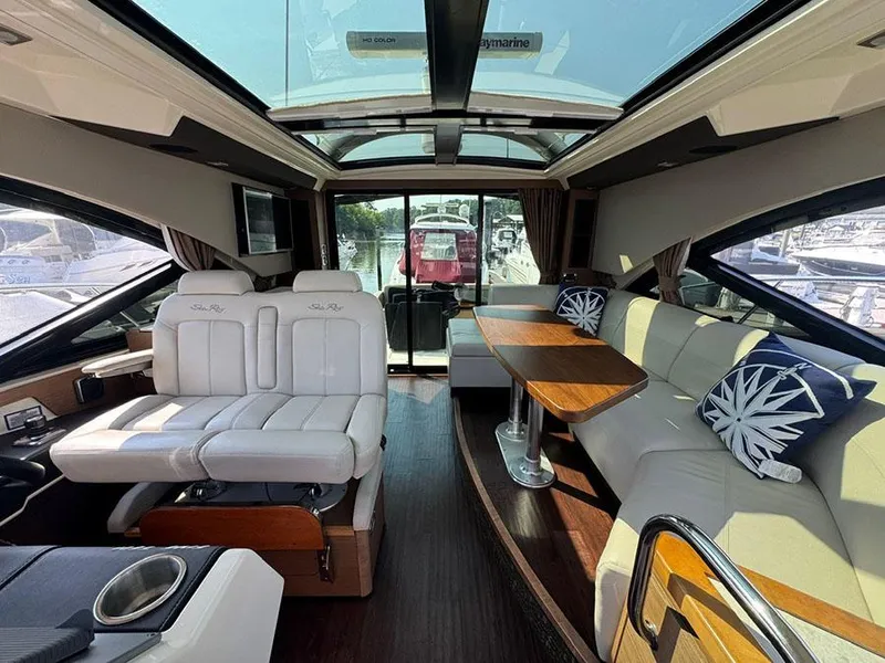 Slide: The Image of Luxurious interior of 2015 Sea Ray 510 Sundancer yacht with plush seating and elegant design. - 42