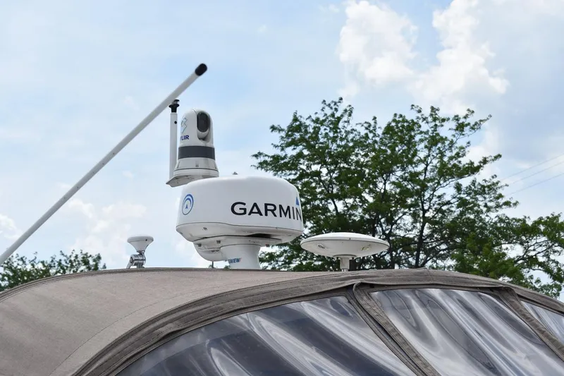 Slide: The Image of Radar and camera equipment on a 2003 Sea Ray 360 Sundancer boat. - 14