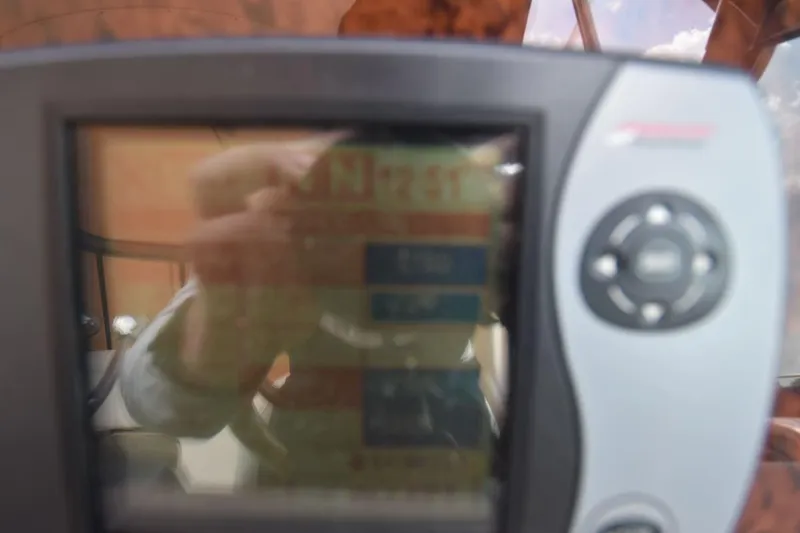 Slide: The Image of Close-up of a navigation device on a 2003 Sea Ray 360 Sundancer boat. - 25