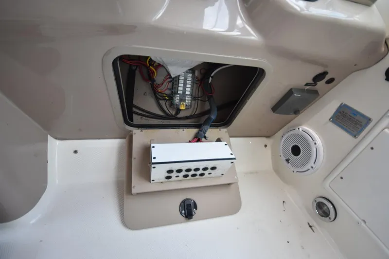 Slide: The Image of Electrical panel and speaker on a 2003 Sea Ray 360 Sundancer boat. - 26