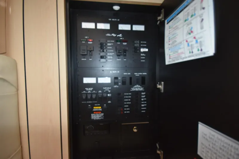 Slide: The Image of Electrical control panel inside a 2003 Sea Ray 360 Sundancer yacht. - 28