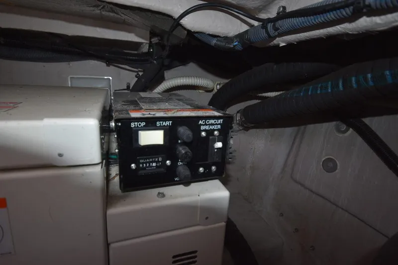 Slide: The Image of Control panel in a 2003 Sea Ray 360 Sundancer boat engine room. - 36