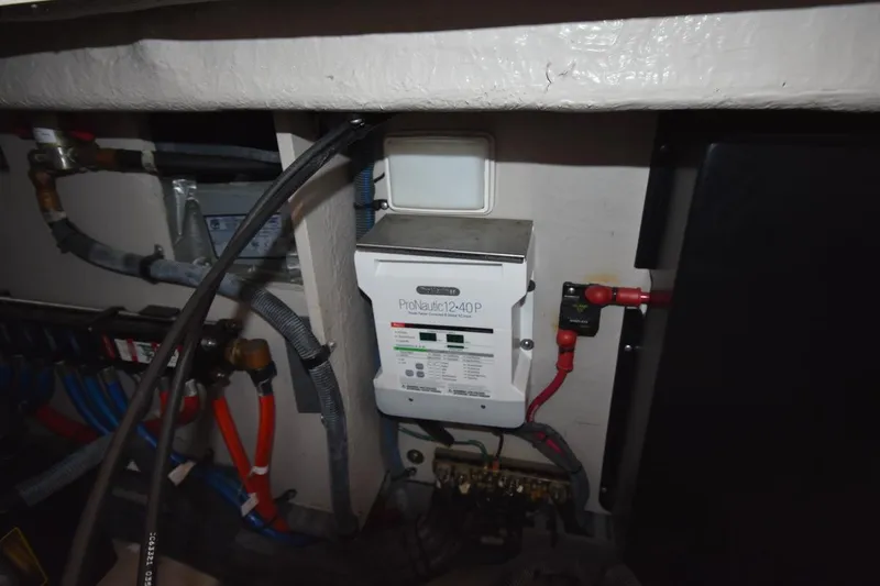Slide: The Image of Electrical system inside a 2003 Sea Ray 360 Sundancer boat. - 39