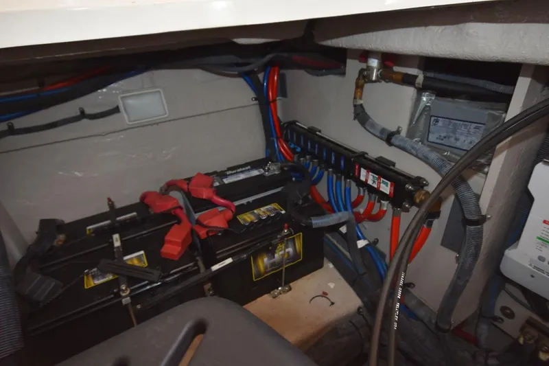 Slide: The Image of Electrical system of a 2003 Sea Ray 360 Sundancer boat, featuring batteries and wiring. - 40