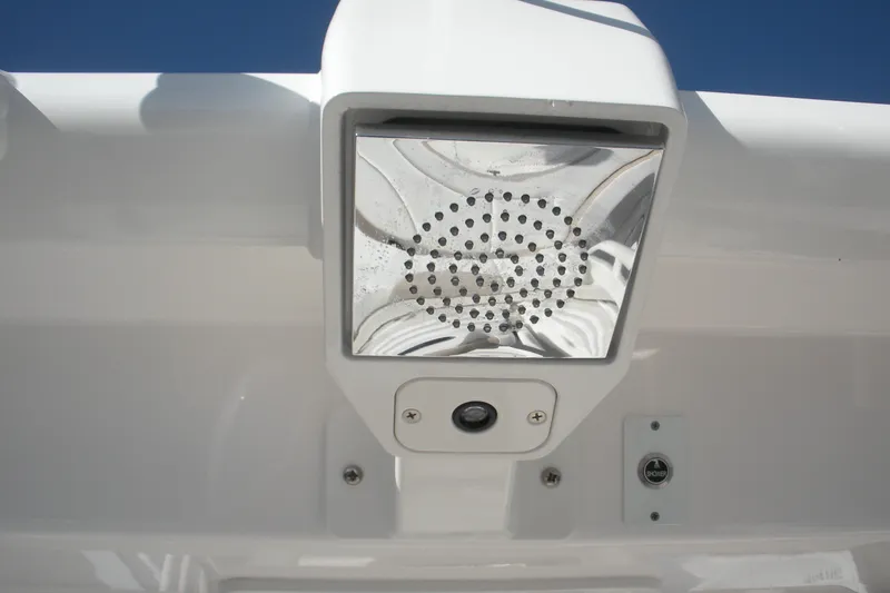 Slide: The Image of 2026 Robalo R300 Center Console boat light fixture close-up. - 16