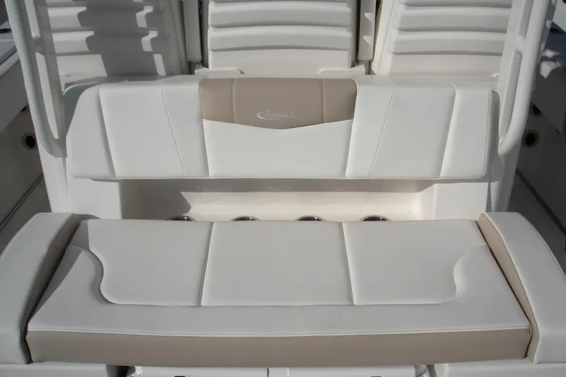 Slide: The Image of 2026 Robalo R300 Center Console boat seating, featuring white and beige cushioned design. - 21