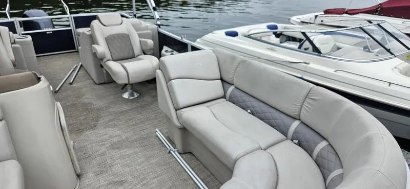 Slide: The Image of 2018 Bennington 22 SCWX pontoon boat with spacious seating and elegant interior design. - 6