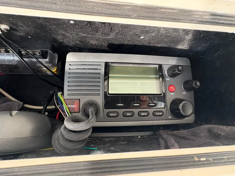 Slide: The Image of VHF marine radio in a 2014 Carolina Classic 25 boat dashboard. - 15