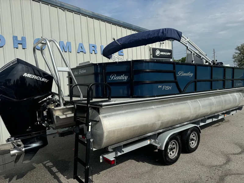 Slide: The Image of 2021 Bentley Pontoons 243 FISH 4PT with Mercury engine on trailer. - 16