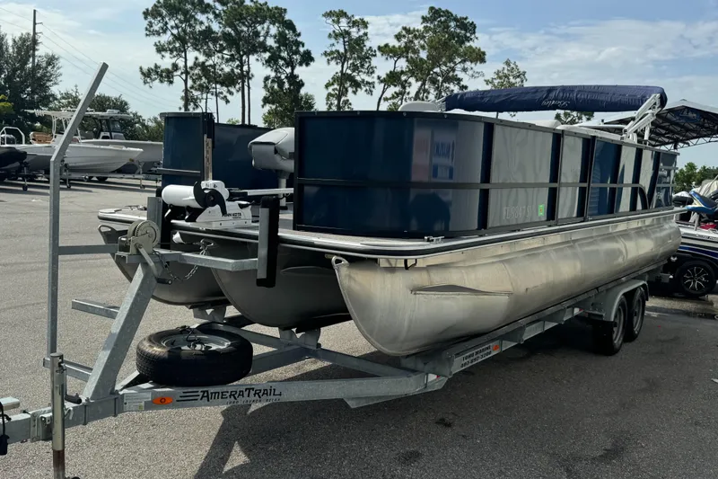 Slide: The Image of 2021 Bentley Pontoons 243 FISH 4PT on trailer in parking lot. - 3