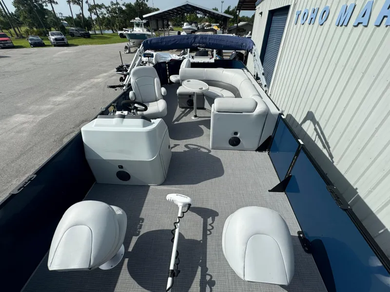 Slide: The Image of 2021 Bentley Pontoons 243 FISH 4PT boat with spacious seating and modern design. - 5