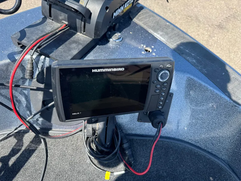 Slide: The Image of Humminbird Helix 7 fish finder on 2005 Skeeter ZX 2050 boat dashboard. - 14