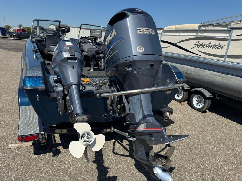 Slide: The Image of 2005 Skeeter ZX 2050 boat with Yamaha 250 outboard motor, parked on a trailer. - 7