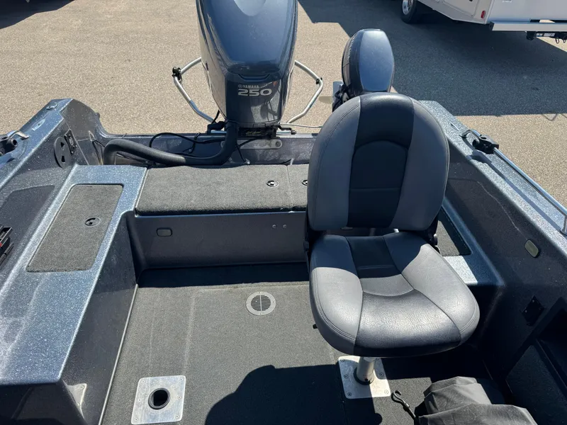 Slide: The Image of 2005 Skeeter ZX 2050 boat interior with Yamaha 250 engine and seating. - 9