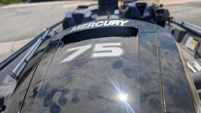 Slide: The Image of Dusty Mercury 75 outboard motor on 2022 Tracker Pro Guide V 16 SC boat. - 10
