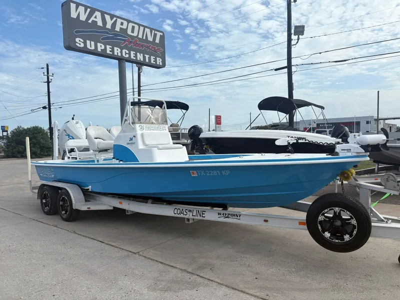 Slide: The Image of Blue 2022 Mamba 24VX boat on trailer at Waypoint Marine Supercenter. - 0