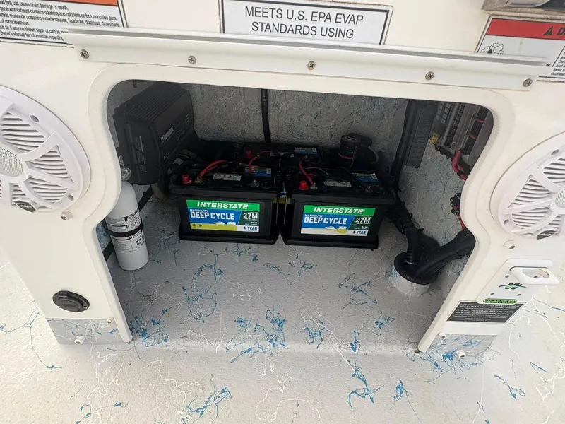 Slide: The Image of Battery compartment of 2022 Mamba 24VX with Interstate deep cycle batteries. - 19