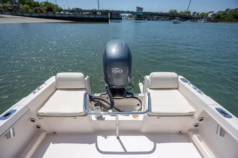 Slide: The Image of 2010 Grady-White Sportsman 180 boat with Yamaha 150 engine on calm water. - 9