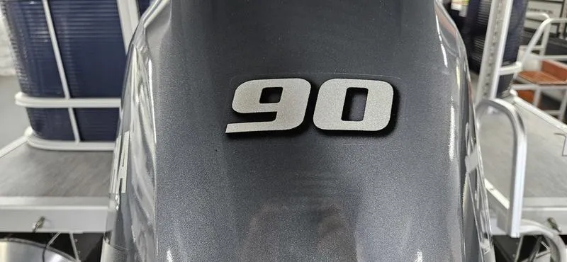 Slide: The Image of Close-up of 2026 Bennington 20 SL boat engine with '90' horsepower label. - 11