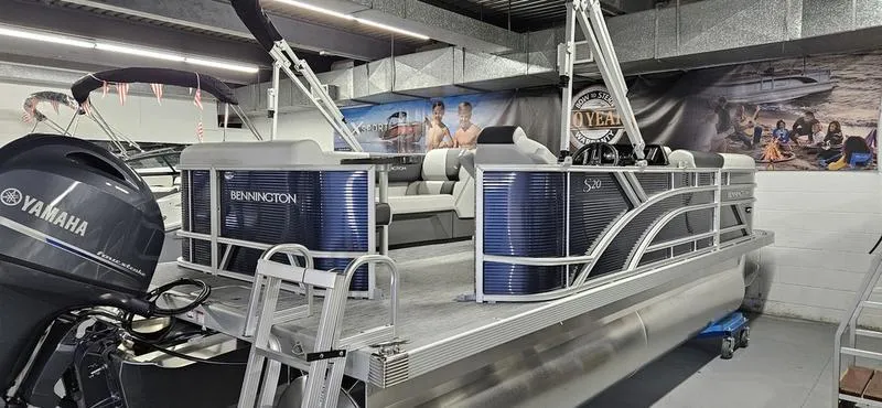 Slide: The Image of 2026 Bennington 20 SL pontoon boat with Yamaha engine in showroom. - 3