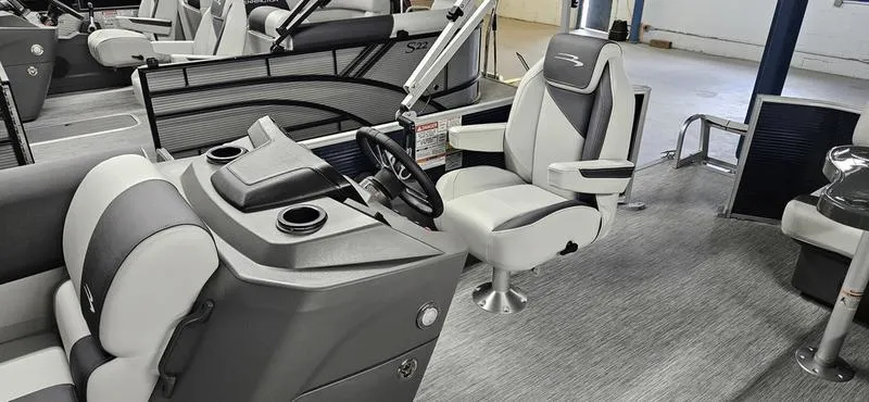 Slide: The Image of 2026 Bennington 20 SL boat interior with modern helm and seating. - 5