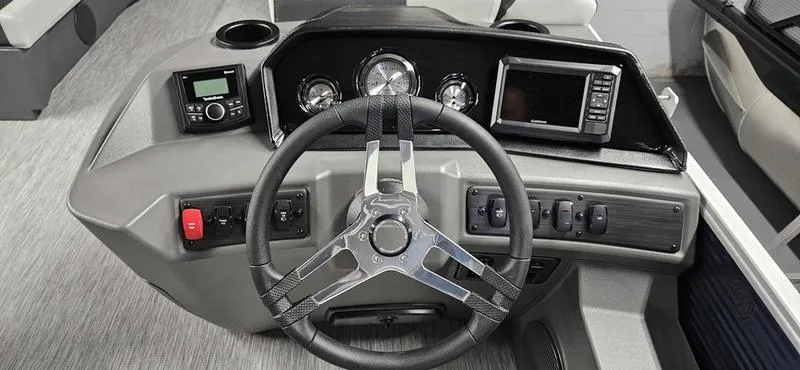 Slide: The Image of Steering console of 2026 Bennington 20 SL boat with modern controls and gauges. - 8