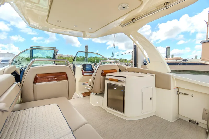 Slide: The Image of Luxurious interior of 2023 Chris-Craft Launch 31 GT boat with elegant seating and modern amenities. - 14